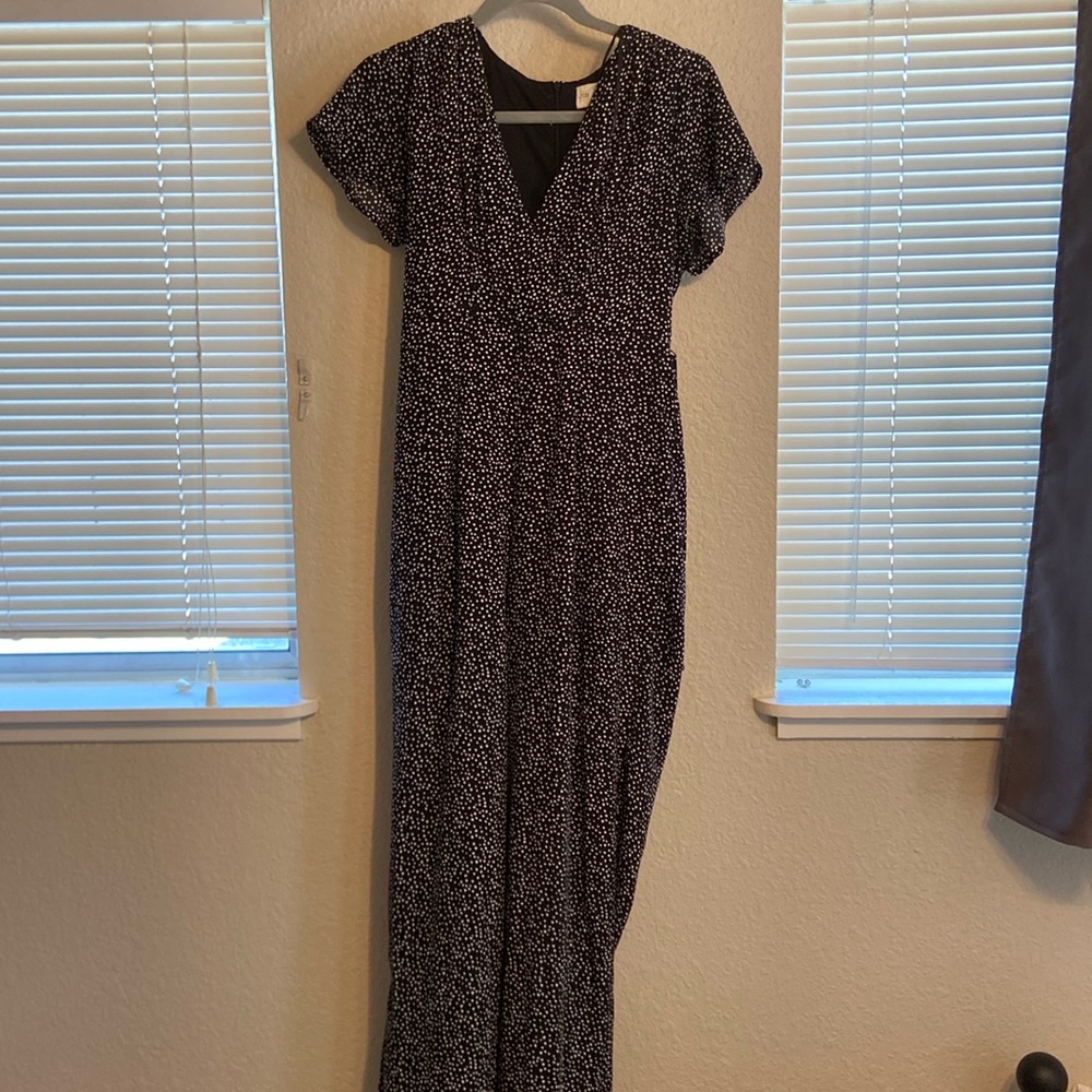 Gorgeous black jumpsuit with white specks.